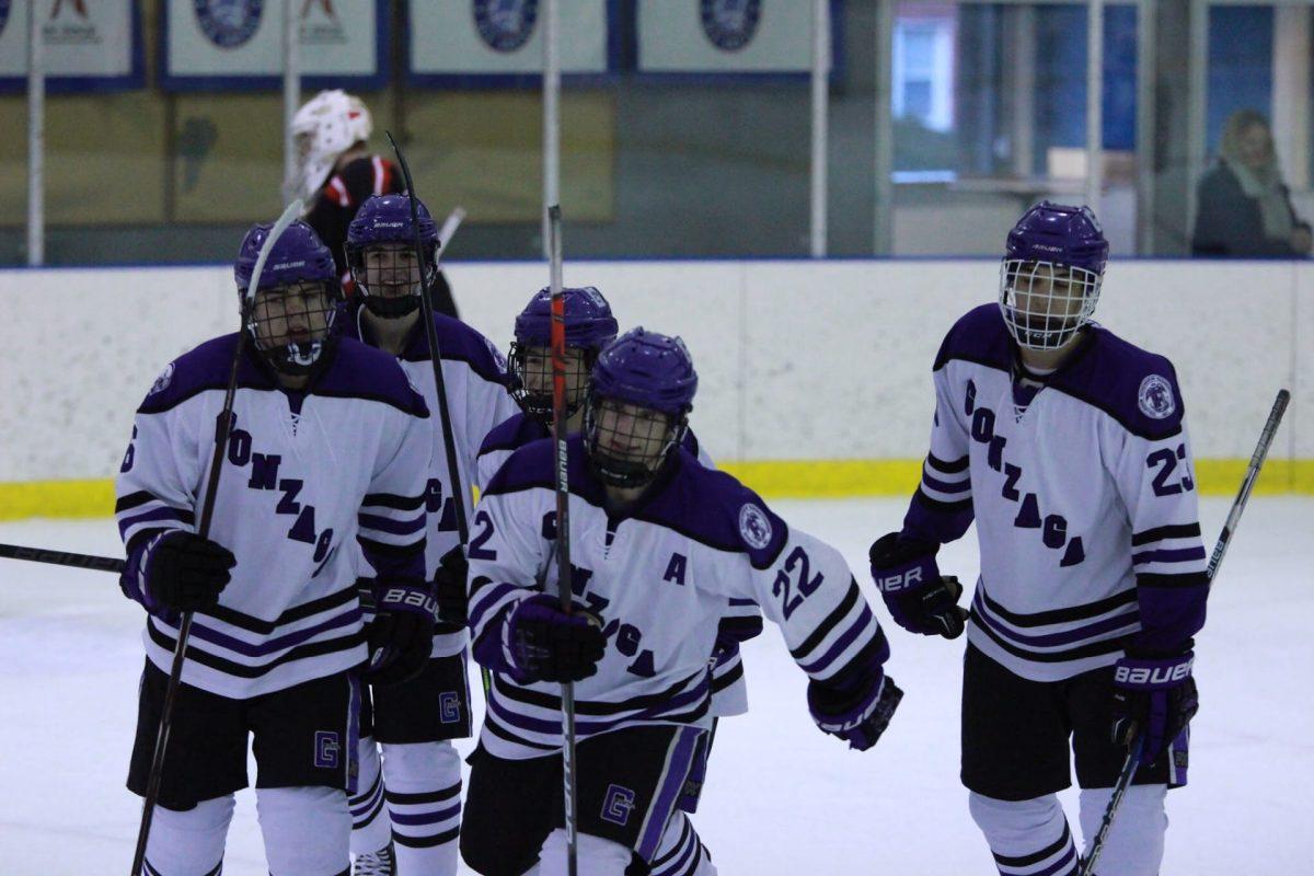 Feral Dinn leading celebration after goal against Spalding