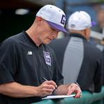 Baseball Coach Chad Carroll writes notes during a game. (Photo from Gonzaga Baseball Flickr - @GZbaseball)