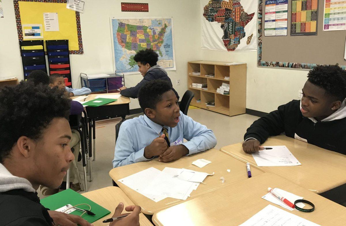 Until this year, club members participated each year in a poetry workshop with students from Bishop Walker School. (Photo by Mr. Joe Ross)