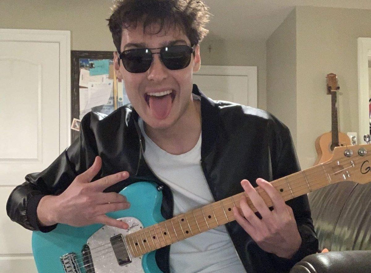 Senior Jack Wood shows off his new electric guitar he's been learning to play over lockdown. (Photo by Jack Wood)