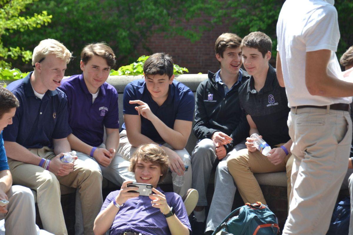 Gonzaga students share a meal together and a few laughs. (Photos from Gonzaga College High School Flickr)