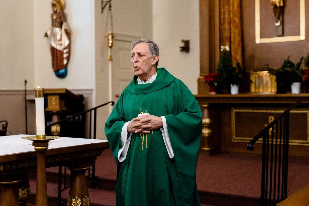 Fr. Gap LoBiondo, SJ is used to being a familiar face around campus, but since the pandemic, he's reduced his interaction with students. He continues to help with the Kairos retreats, though. Here, Fr. Gap celebrates a Mass on from the January 2019 Kairos. (Photo by Mrs. Teresa Jackson) 