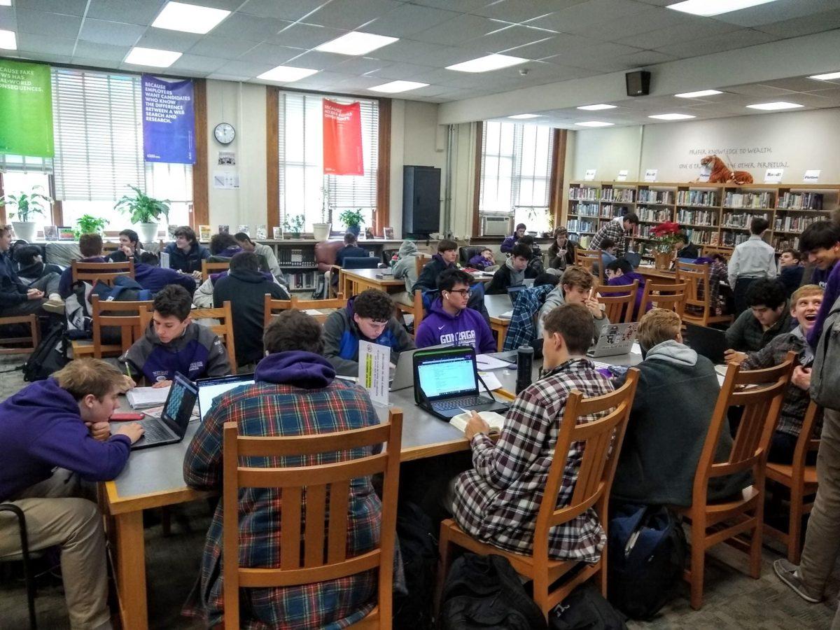 In normal years, Gonzaga's library is usually packed with students. This year, the library has had to be creative in how to get books and movies into the hands of students, moving to adding digital platforms. (Photo by Mrs. Pam Valeiras)