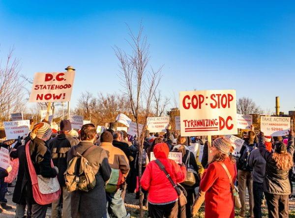 D.C. residents rallying against the GOP and fighting for statehood. (Photo by DCist)