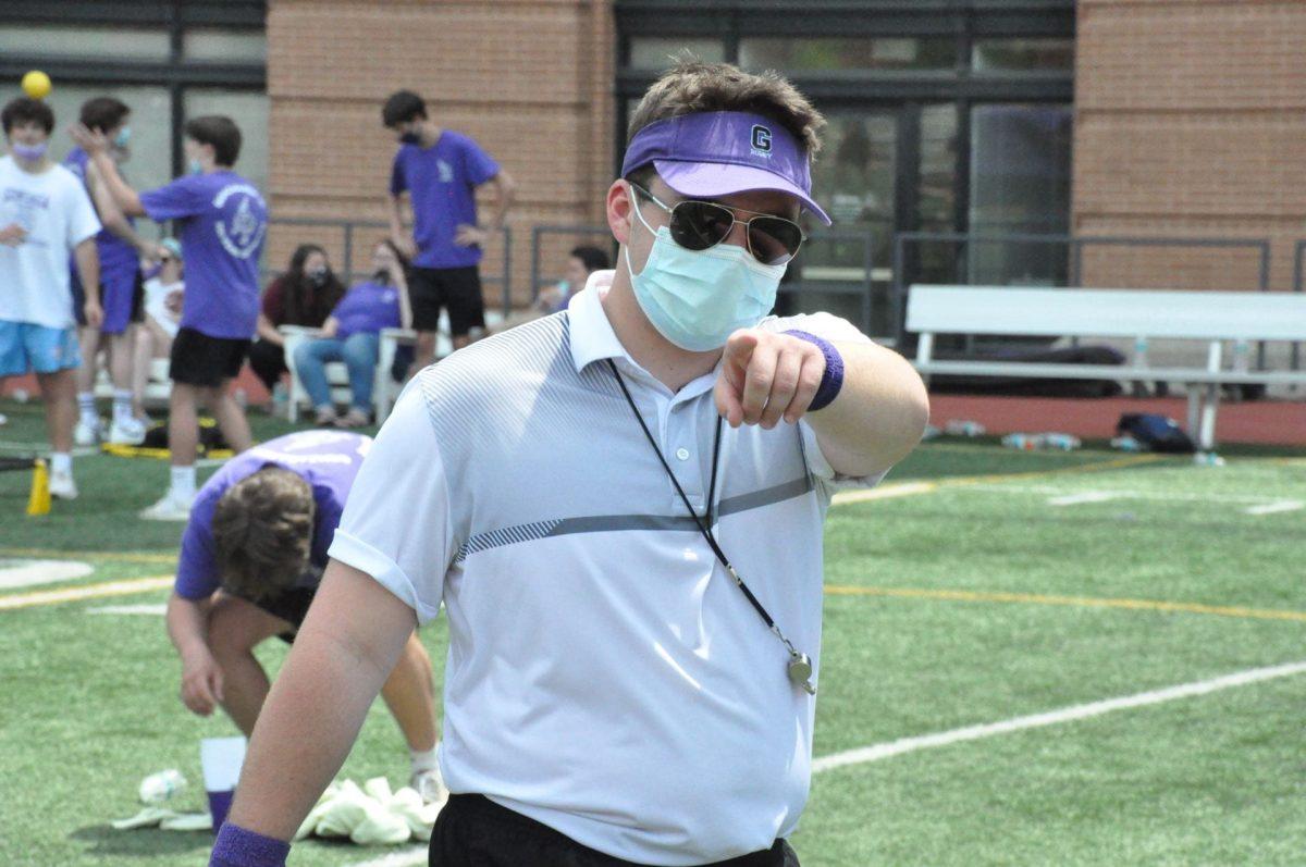 SGA President Mak Krivka points at the camera. (Photo Credit by Luke Elliott)