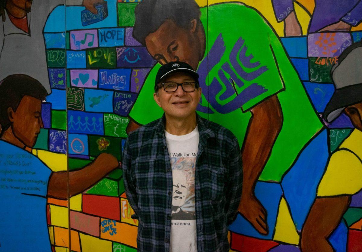 Jhonny Daza, janitor at the Father McKenna Center, has a complex story for how he came to Eye Street. Photo by Matt Podratsky