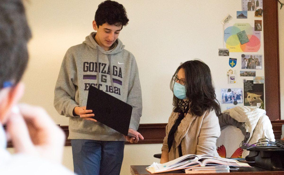 Madame Alexia Gino-Saliba works with a student during class. Photo taken by Andrew Kalitka / Photo II