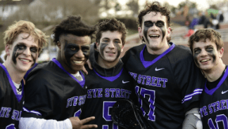 Freddy Fowler, junior, Cody Hobson, junior, Declan Monahan, senior, Matthew Rienzo, senior, and Robert Bath, junior, celebrate after blow out win against Landon.