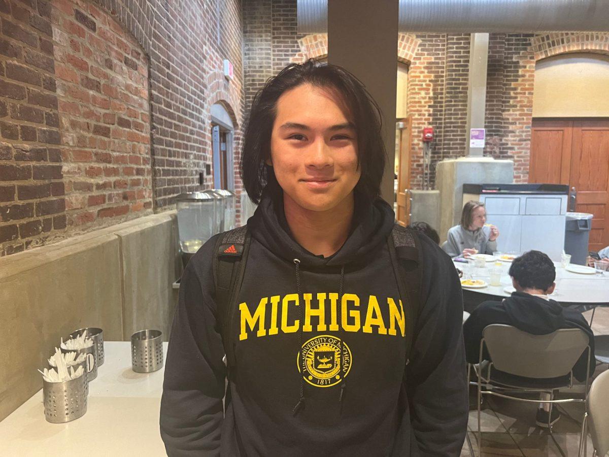 Senior Nick Gaston wears a University of Michigan Hoodie, where he will be attending in the fall. Photo by Jon Bouker