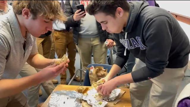 Seniors Wyatt Croog(left) and Liam Passey(right) dig into their burritos.