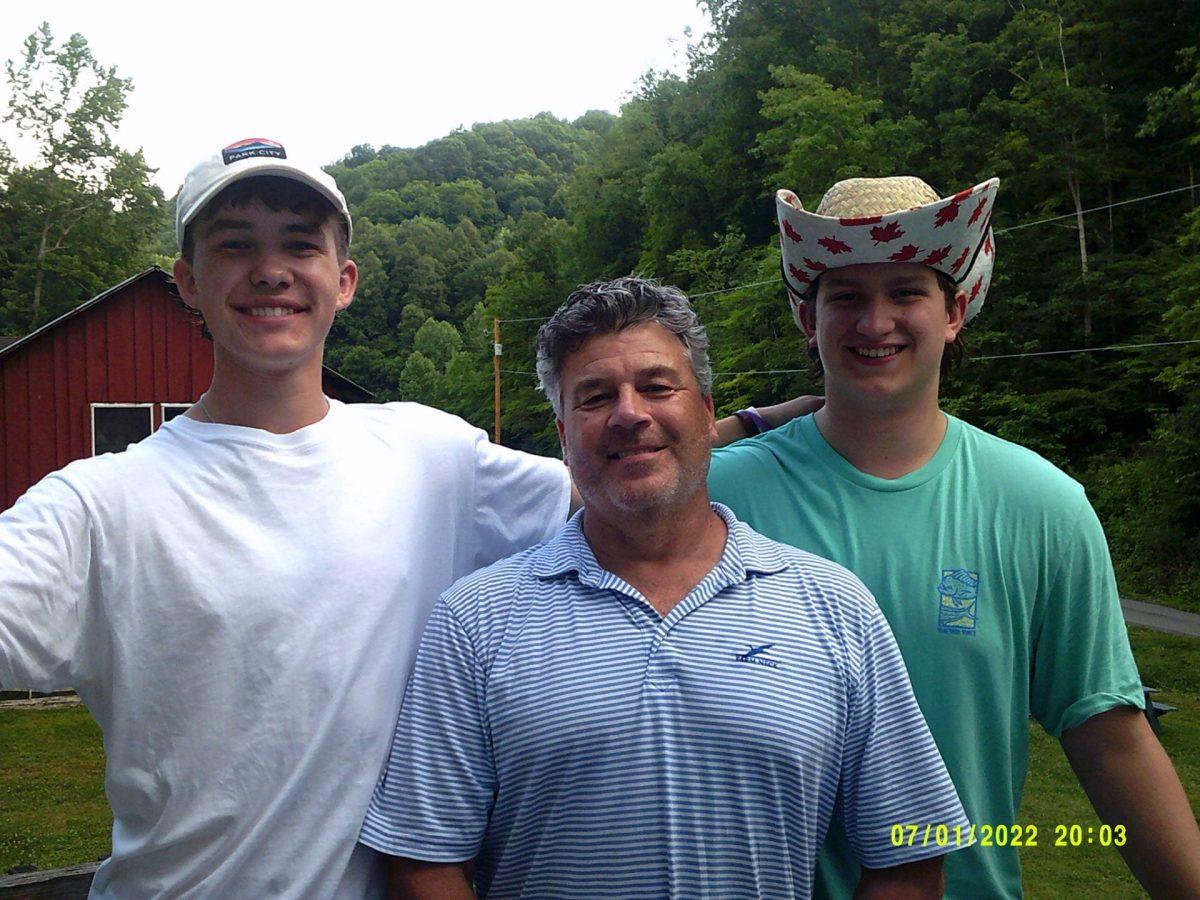 Jack Donaldson, senior, Mr. Patrick Gallagher, director of college counseling, and Jackson Taylor, senior, pose together for a photo at their service trip to Nazareth Farm. Photo submitted by Jack Donaldson