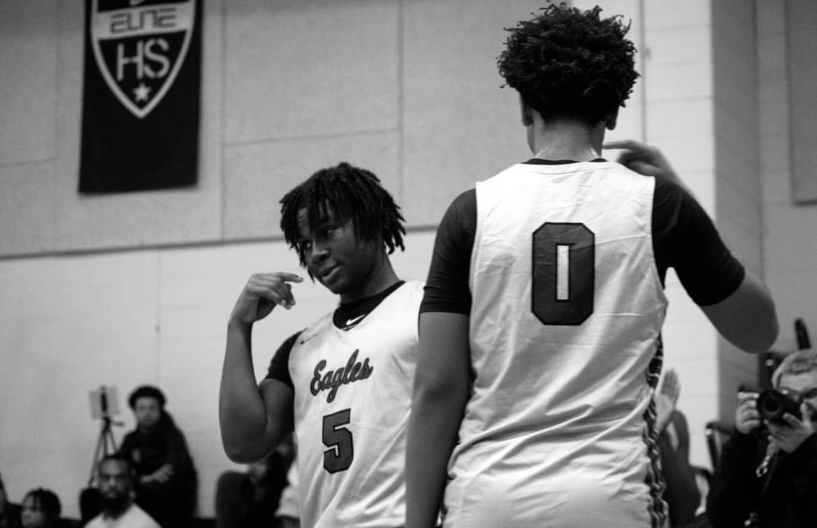 Nyk Lewis '25 and Blake Harper '24 celebrate basket, showing the bond that the two share on and off the court.