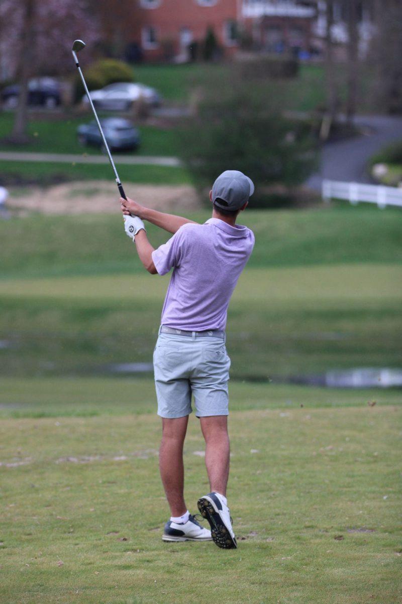 Gonzaga varsity golfer strikes a tee shot in recent match.