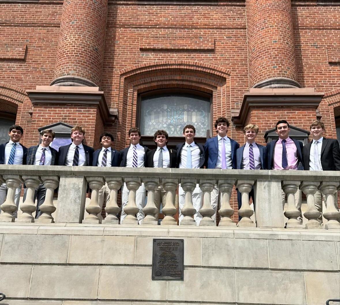 Photo of Class of 2024 SGA cabinet with their successors in the Class of 2025 out front of St. Aloysius Church after being announced on Charter Day. Photo from @gonzagasga instagram.